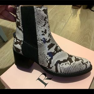 Brand new, NEVER USED RAID SNAKE PRINT BOOTS